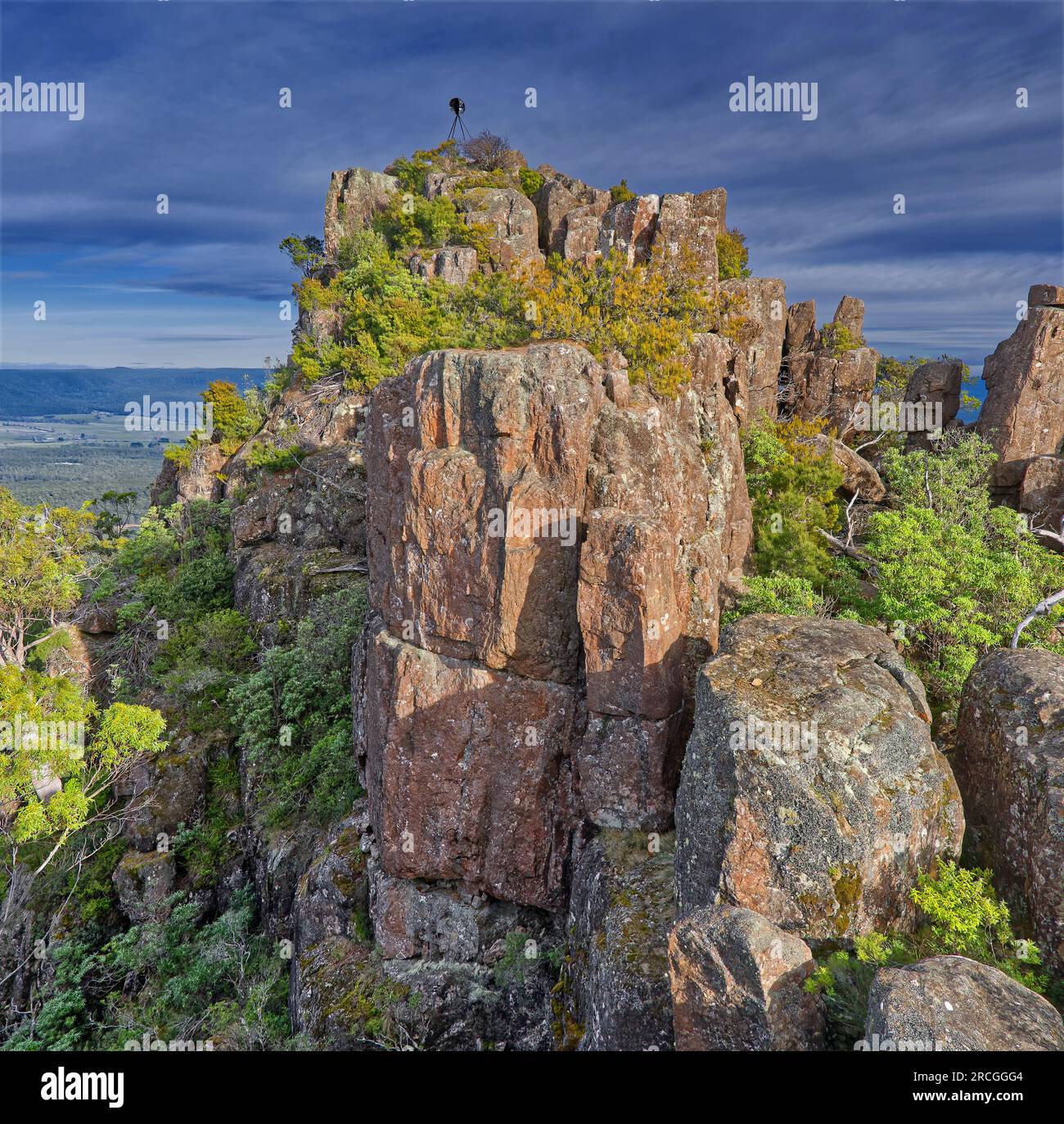 Rocky mountain peak and trig on top of St Patricks head, St Marys, Tasmania, Australia Stock Photo