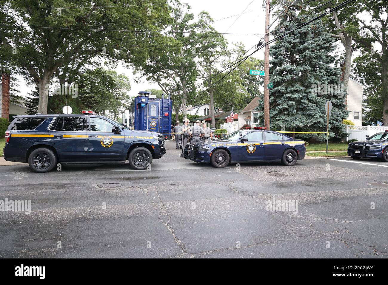 MASSAPEQUA PARK, NEW YORK JULY 14 Law enforcement officials are seen