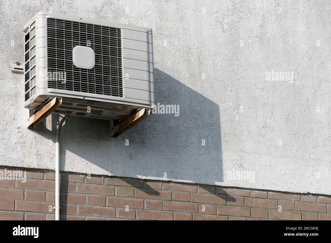 Ac Unit Cladding Sunlit house facade wall partially clinker coating with air ...