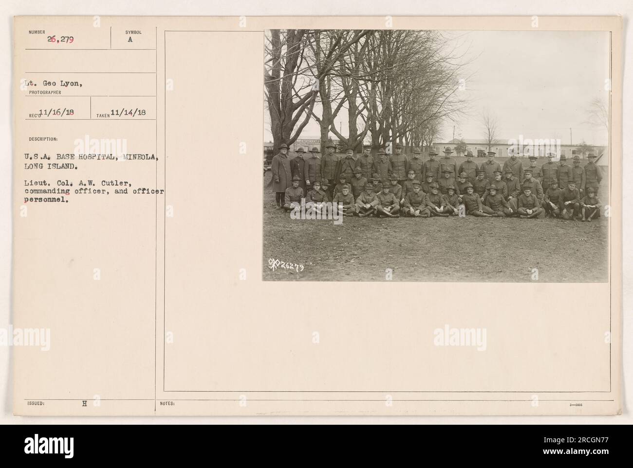 Lieutenant Colonel A.W. Cutler, commanding officer of a U.S.A. Base Hospital located in Mineola, Long Island. This photograph, taken on November 14, 1918, depicts Lt. Col. Cutler and other officer personnel at the hospital. Identifier: 111-SC-26279. Stock Photo