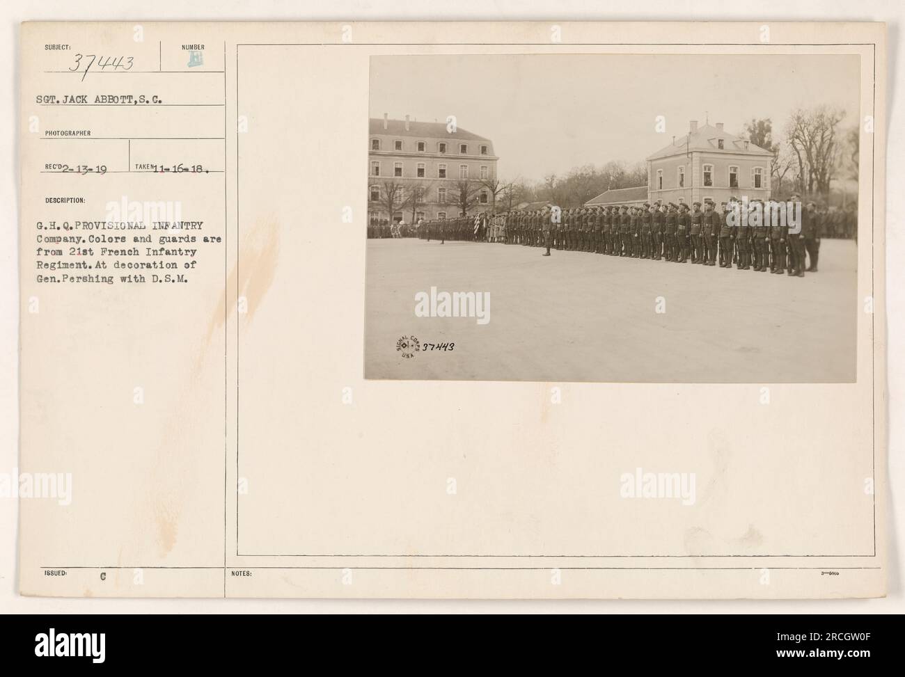 Sergeant Jack Abbott, S.C. photographer, captured this photograph (number 37443) on February 13, 1919. It shows the 21st French Infantry Regiment guarding the colors at the decoration ceremony of General Pershing with the Distinguished Service Medal (D.S.M.). Stock Photo