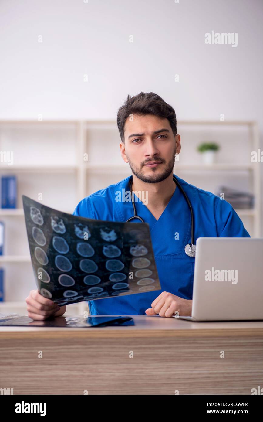 Young male doctor radiologist working in the clinic Stock Photo