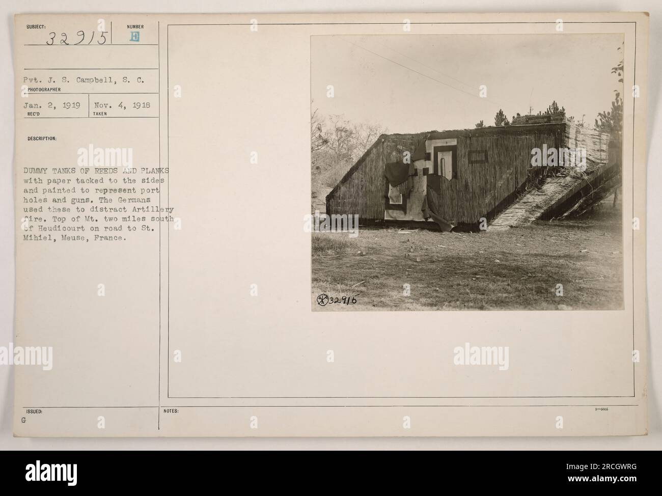 'Dummy tanks made of reeds and planks, with paper decorations to resemble port holes and guns. The Germans utilized these to divert artillery fire. Located on top of a mountain approximately two miles south of Heudi Court on the road to St. Mihiel, Meuse, France. Photograph taken on November 4, 1918.' Stock Photo