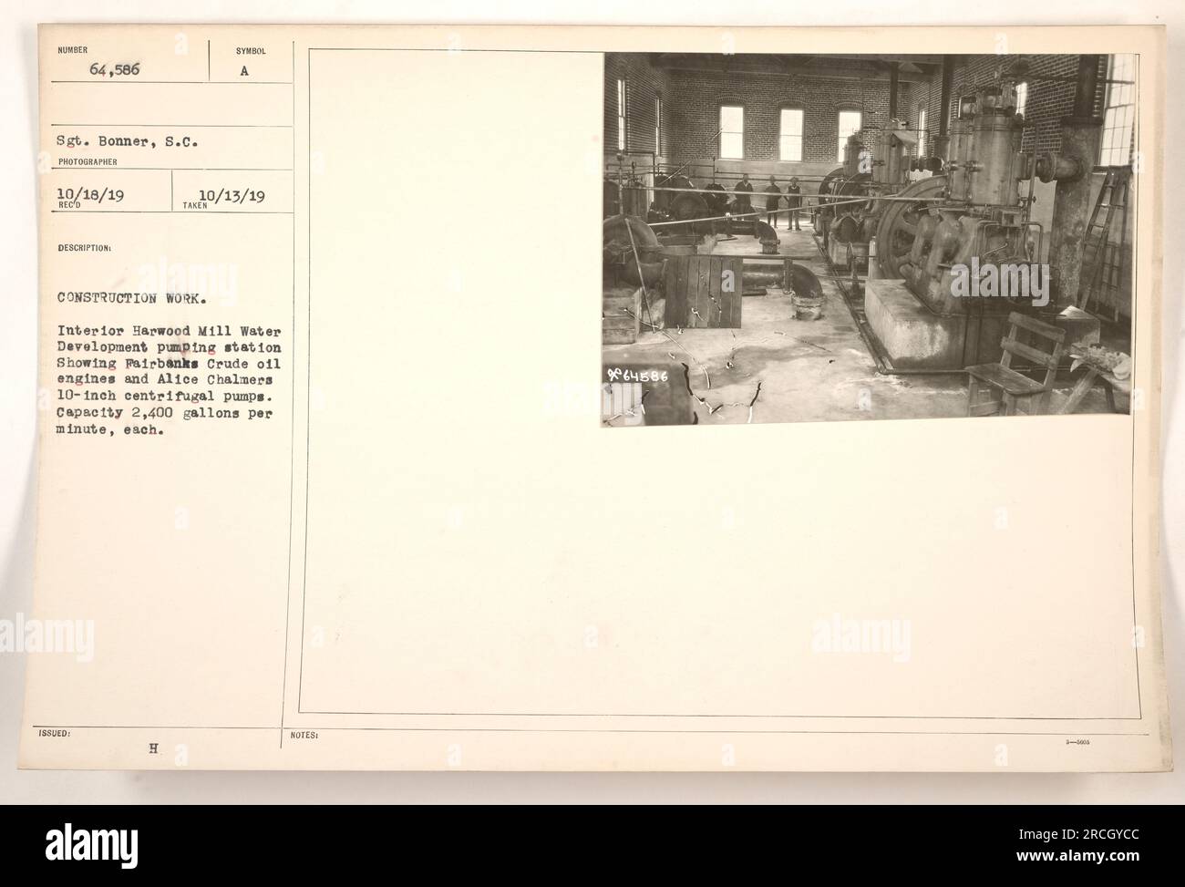 Interior of the Harwood Mill Water Development pumping station during construction. The station features Fairbanks Crude oil engines and Alice Chalmers 10-inch centrifugal pumps. Each pump has a capacity of 2,400 gallons per minute. This photograph, taken by Sgt. Bonner on October 18, 1919, showcases the progress of the construction project. Stock Photo