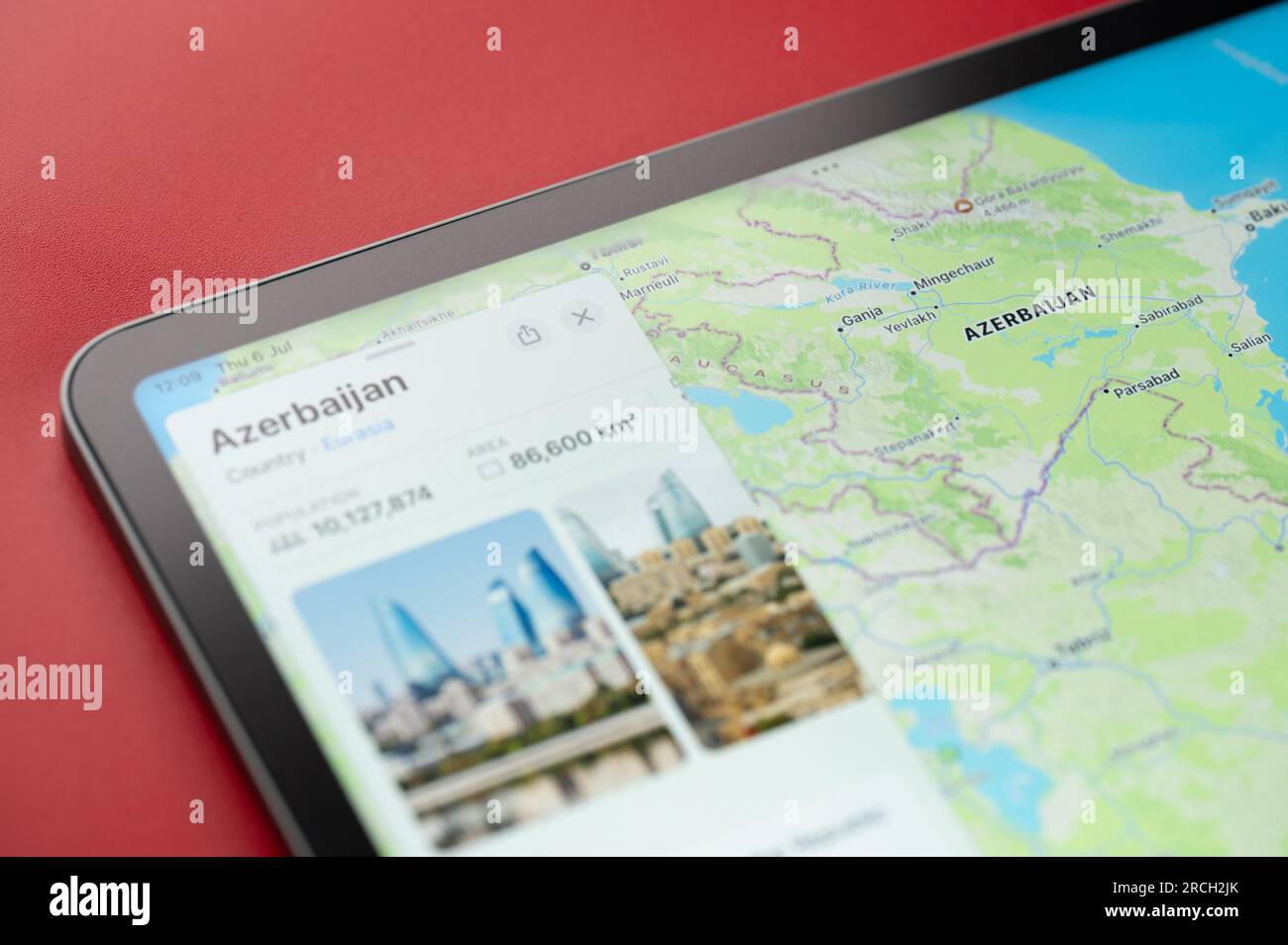 New York, USA - July 6, 2023: Azerbaijan  country on world map in screen of ipad tablet close up view Stock Photo