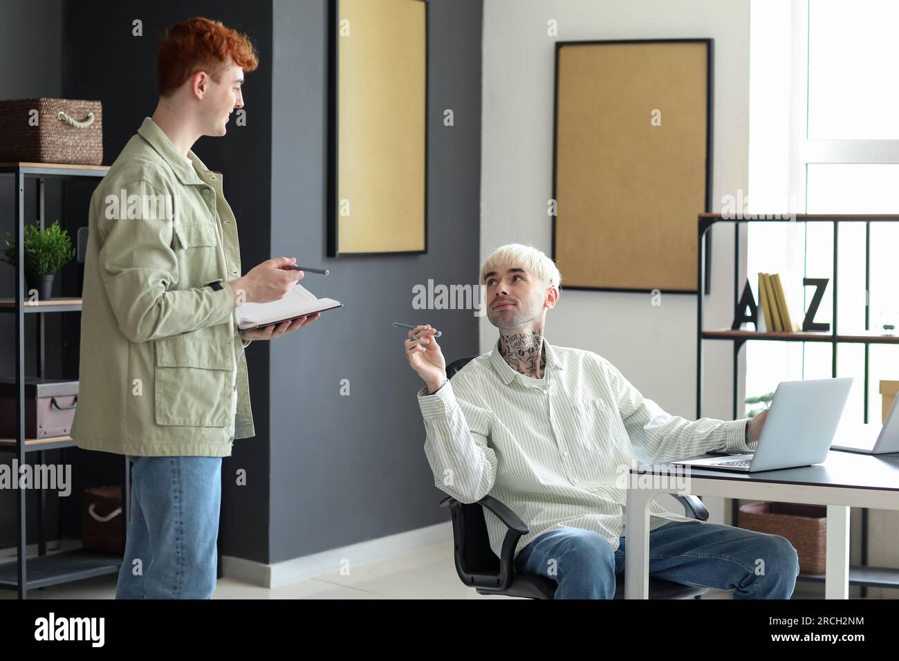 Male programmers working in office Stock Photo