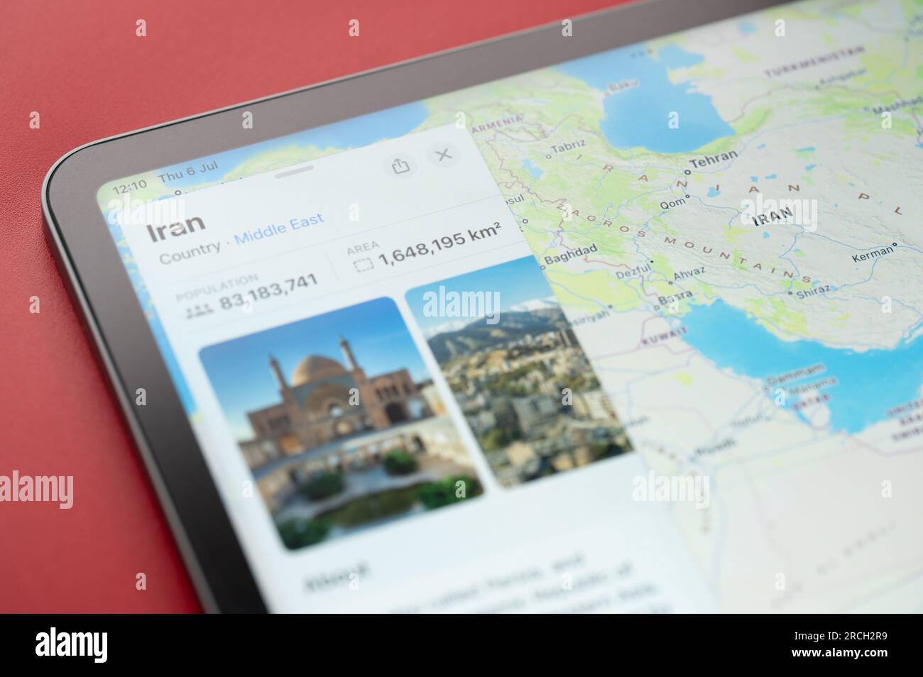 New York, USA - July 6, 2023: About Iran country in digital map ipad macro close up view Stock Photo