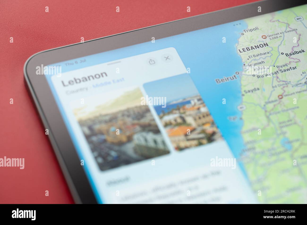 New York, USA - July 6, 2023: Boarder line on Lebanon country with info on world apple map ipad macro close up view Stock Photo