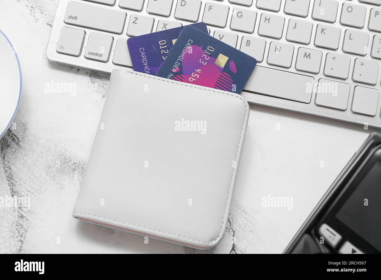 Keyboard with wallet and credit cards on grunge white background Stock ...