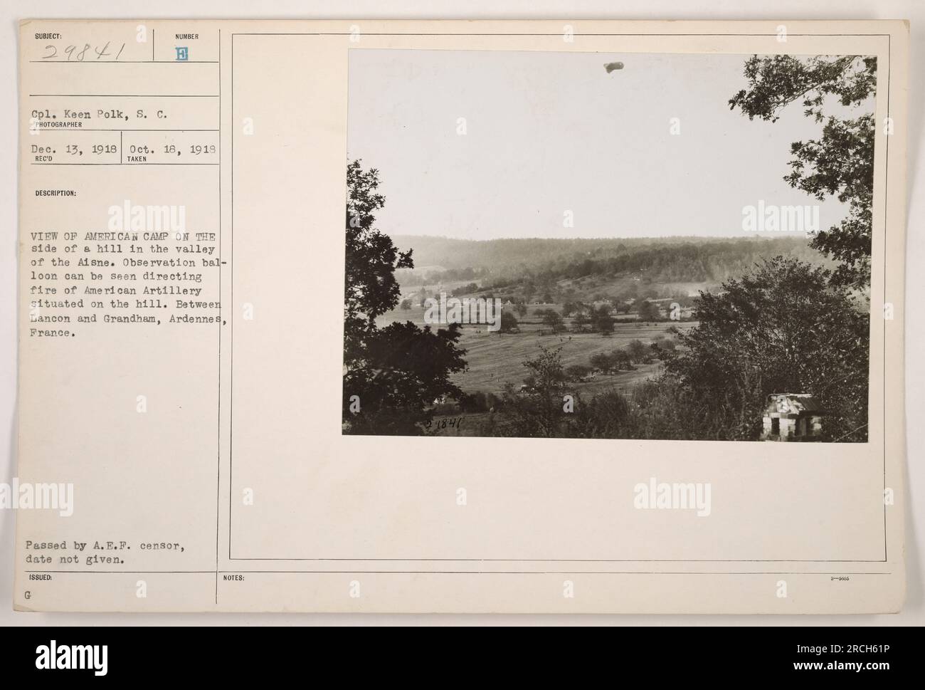 'A view of an American camp on the side of a hill in the Aisne valley during World War One. In the image, an observation balloon can be seen directing the fire of American artillery stationed on the hill. The location is between Lancon and Grandham in Ardennes, France. This photograph passed censorship by A.E.P., but the date of the censoring is not provided.' Stock Photo