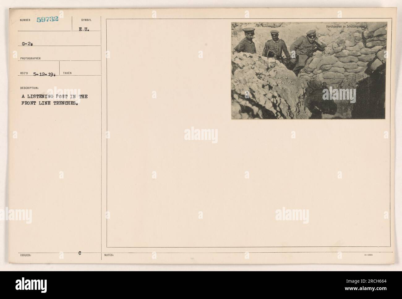 A photograph of a listening post in the front line trenches during World War One. This image was taken on May 12, 1919, by photographer NUMBER 59732 G-2 PHOTOGRAPHER RECO. The location is not specified, but it was likely in Europe (symbol issued E.U.). Notes suggest that the post is called 'Morchposten in Schätz.' Stock Photo