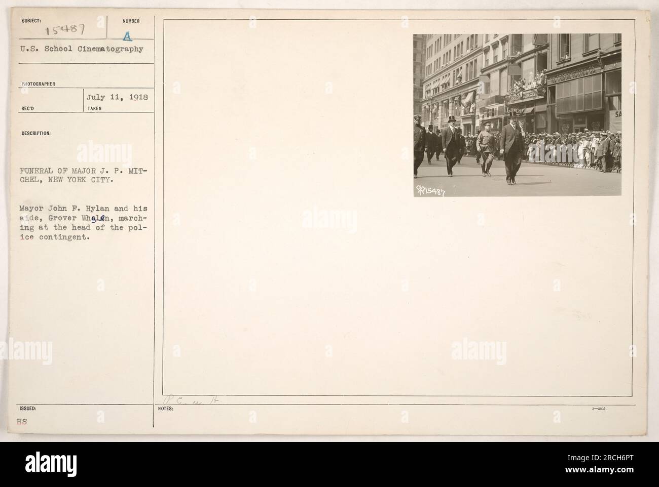 Caption Mayor John F. Hylan and his aide, Grover Whalen, lead a police