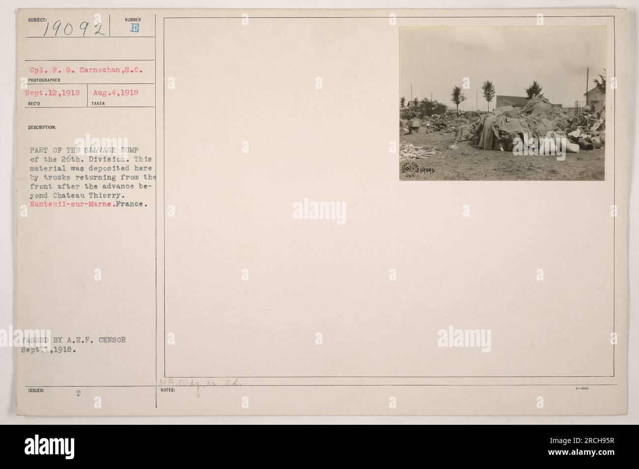 Image depicting a salvage dump of the 26th Division. The material present was brought by trucks returning from the front after the advance beyond Chateau Thierry. Location is Nanteuil-sur-Marne, France. Photograph taken by Cpl. P. G. Carnochan on August 4, 1918. Approved by A.E.F. Censor on September 1, 1918. Stock Photo