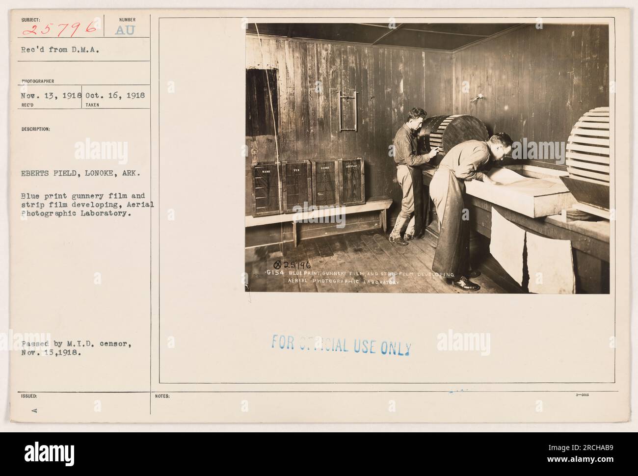 Image taken on October 16, 1918 at Eberts Field, Lonoke, Ark, showing the process of blue print gunnery film and strip film developing at the Aerial Photographic Laboratory. The image was reviewed and passed by the M.I.D censor on November 15, 1918, and was labeled for official use only. Stock Photo