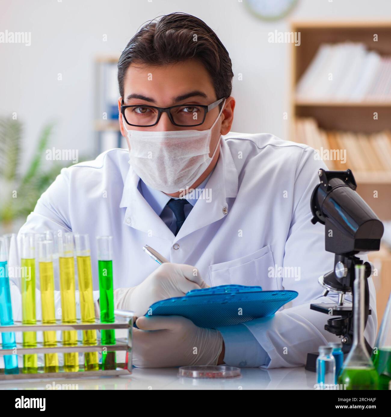 The doctor working in the lab Stock Photo - Alamy