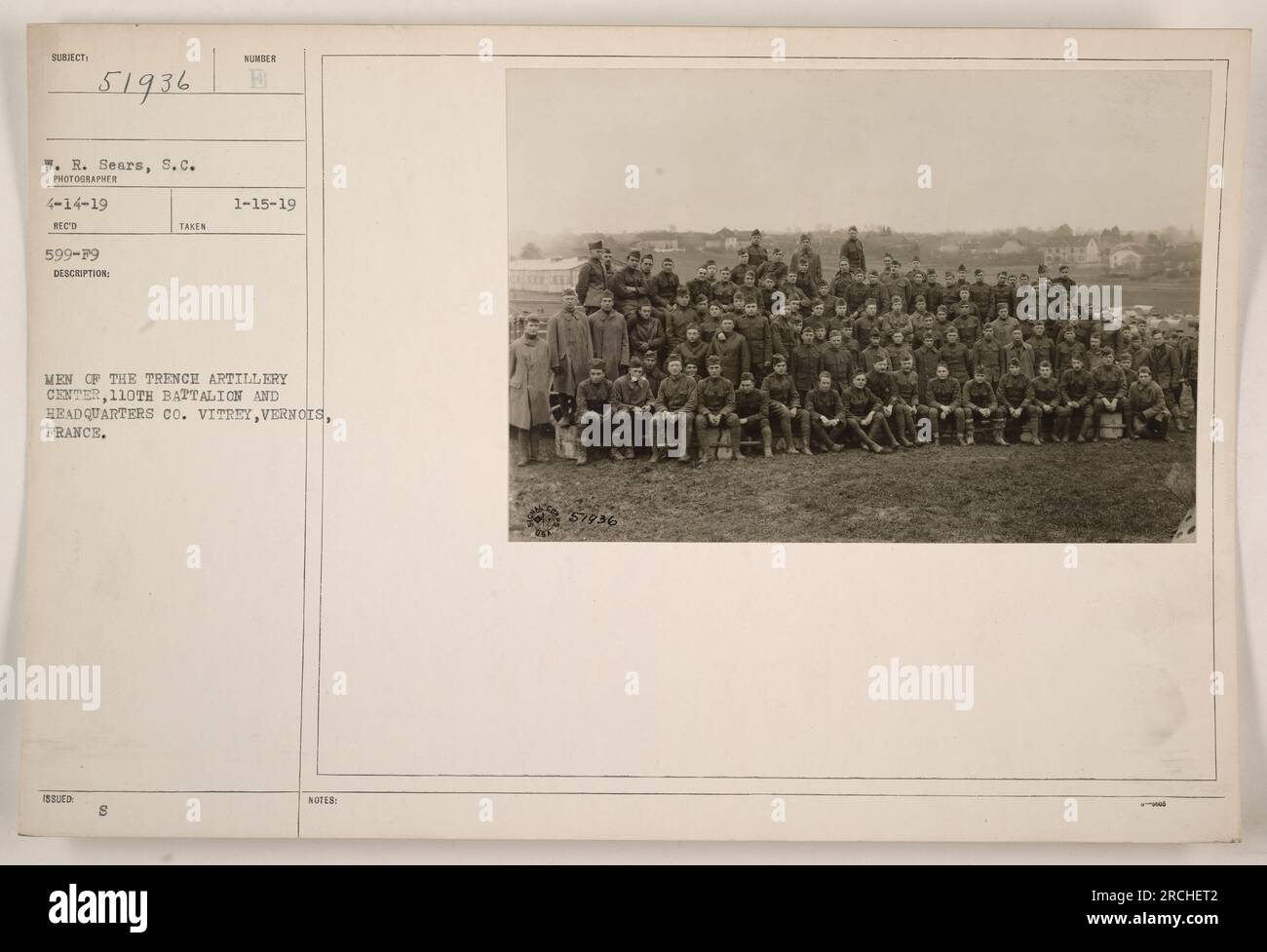 Men of the Trench Artillery Center, 110th Battalion, and Headquarters Co. at Vitrey, Vernois, France. This photograph was taken on April 14, 1919, by photographer W.R. Sears. The image shows 8 men in uniform. Notes indicate it was taken on January 15, 1919, and the reference number is 57936. Stock Photo