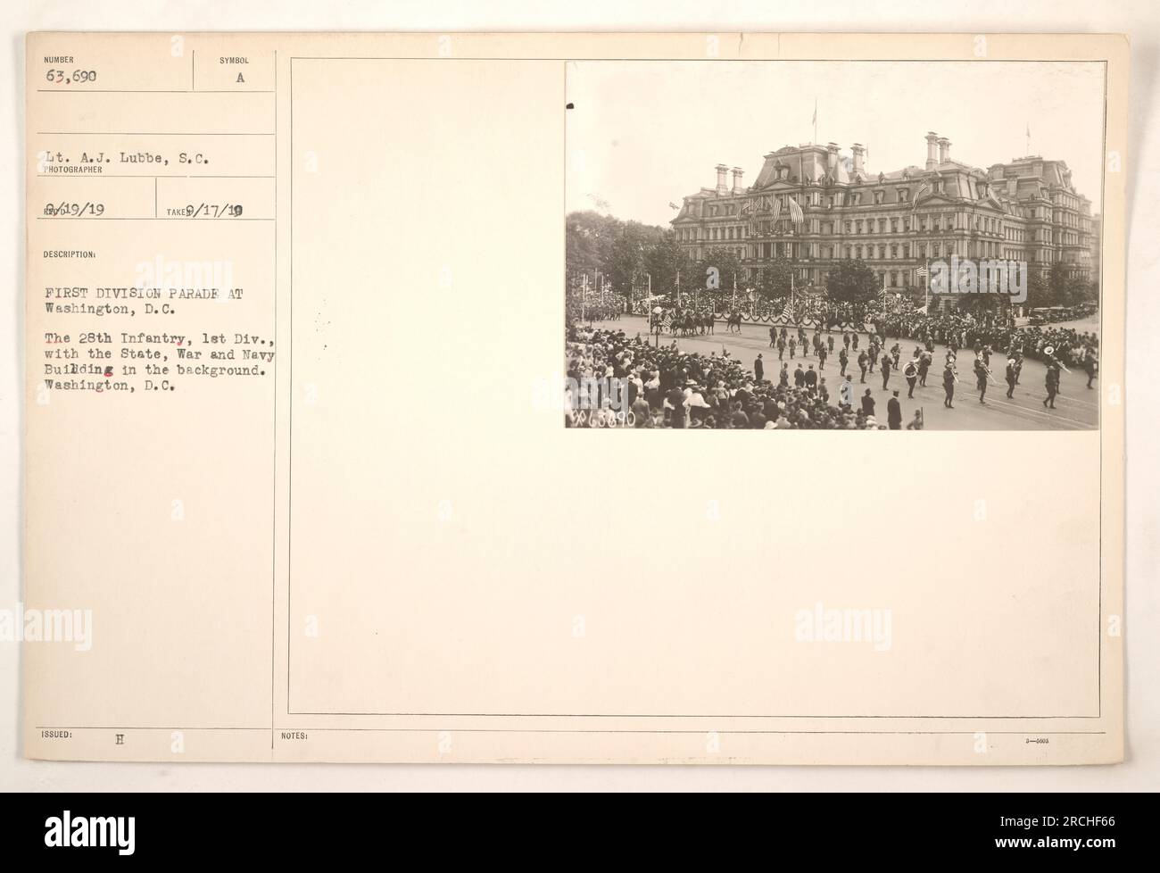 28th Infantry, 1st Division marching in a parade in Washington, D.C. The State, War and Navy Building can be seen in the background. The photo was taken by Lieutenant A.J. Lubbe and is identified by the description issued symbol A. The print is 19/19 in the collection. Stock Photo