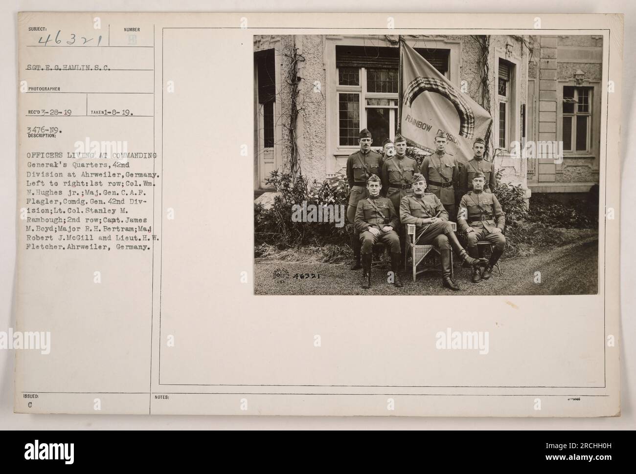 Officers residing at the Commanding General's Quarters, 42nd Division in Ahrweiler, Germany. From left to right: 1st row - Col. Wm. N. Hughes Jr., Maj. Gen. C.A.F. Flagler, and Lt. Col. Stanley M. Rambough; 2nd row - Capt. James M. Boyd, Major R.H. Bertram, Maj. Robert J. McGill, and Lieut. H.W. Fletcher. Ahrweiler, Germany. Photograph taken on January 8, 1919. Stock Photo