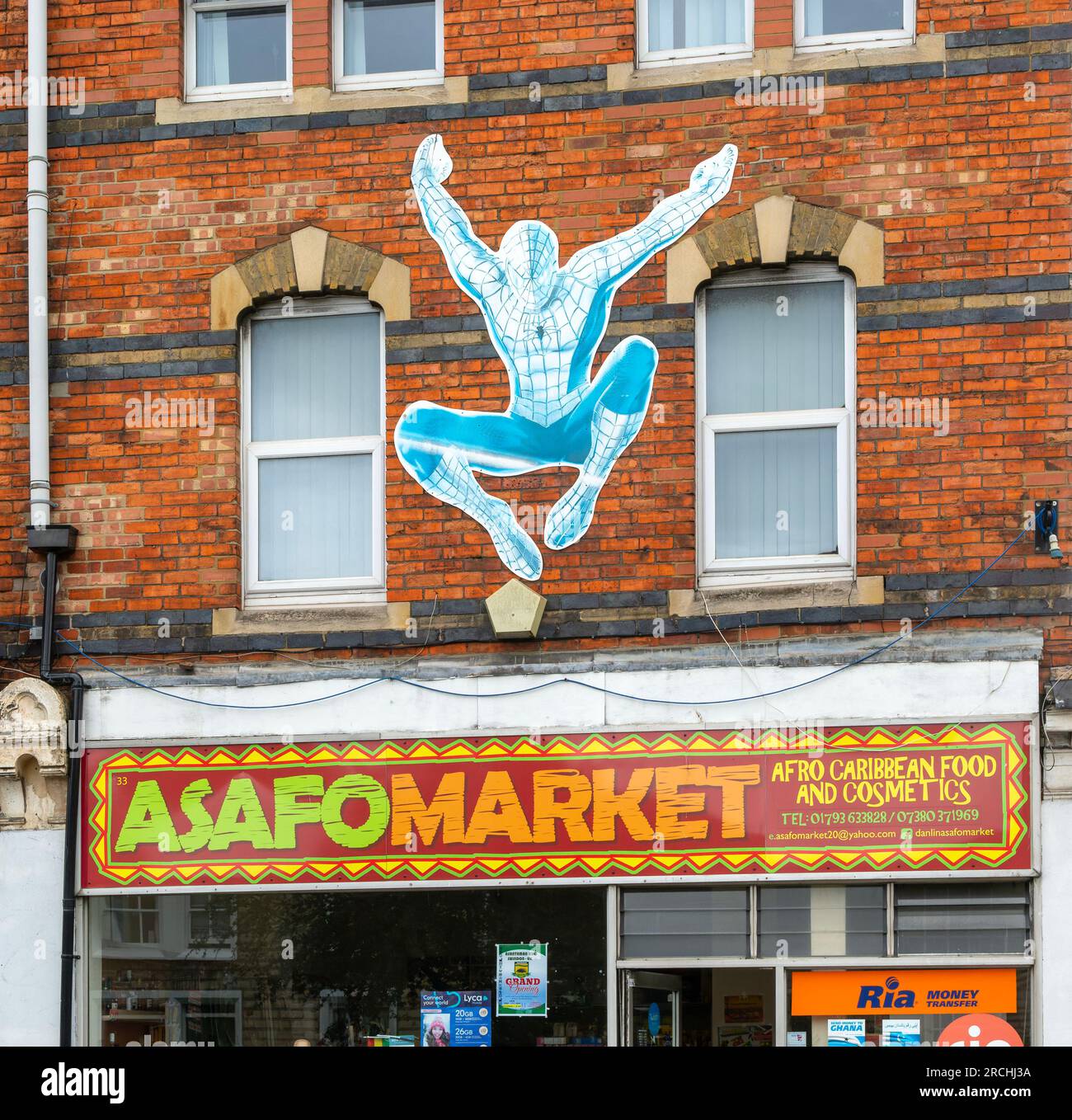 Spider Man figure on Asafo Market, Afro Caribbean shop, Faringdon Road, Swindon, Wiltshire, England, UK Stock Photo