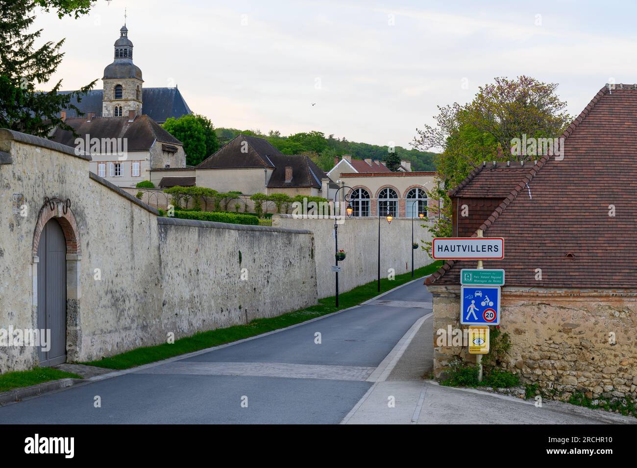 Walking in touristic old village with abbey Hautvillers, cradle of sparkling wine champagne, France. Stock Photo