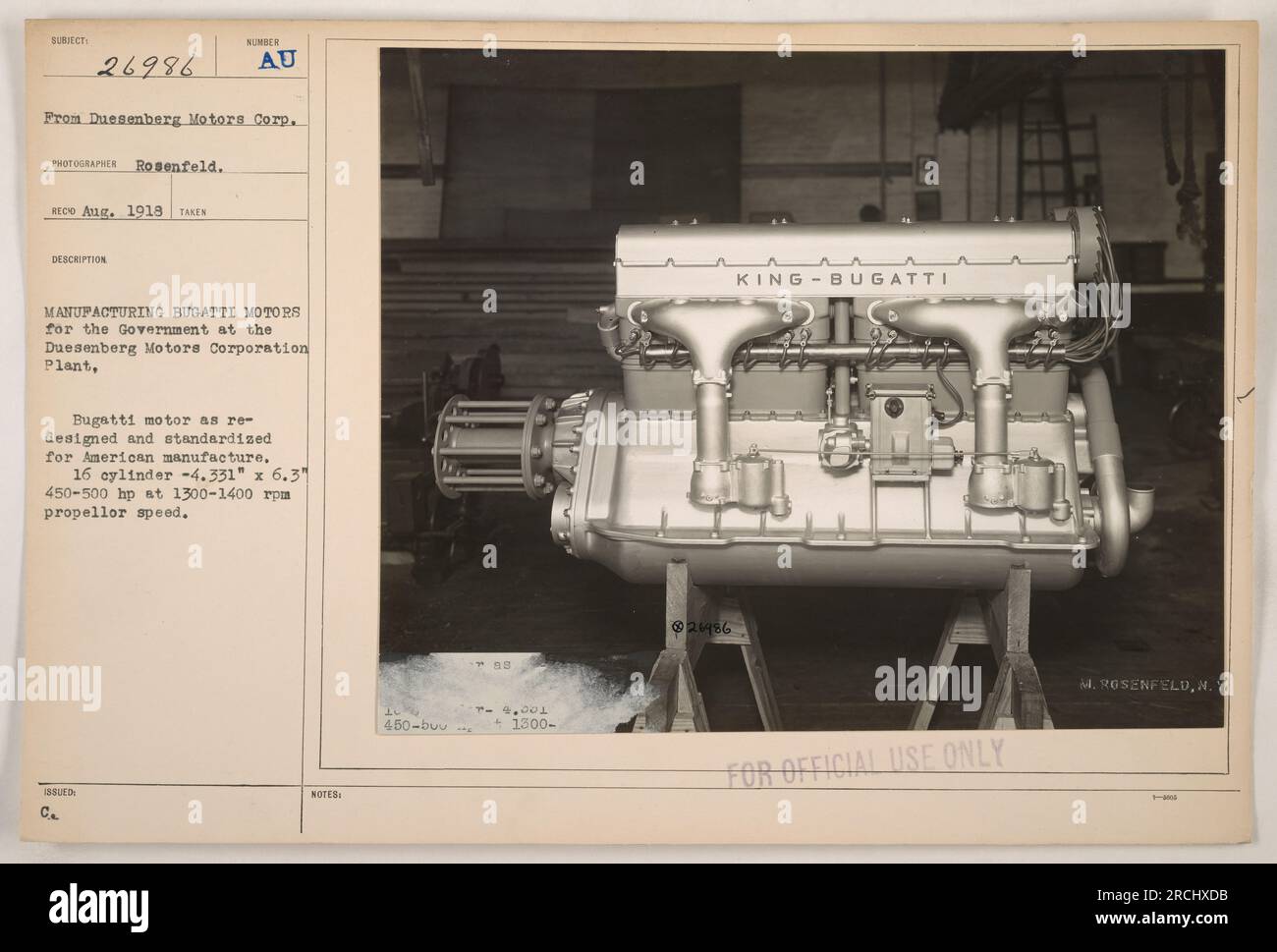 Image of a Bugatti motor being manufactured at the Duesenberg Motors Corporation Plant in 1918. The Bugatti motor has been re-designed and standardized for American manufacture. It is a 16 cylinder engine, measuring 4.331' x 6.3 and producing 450-500 horsepower at 1300-1400 rpm propeller speed. The photograph was taken by Rosenfeld from Duesenberg Motors Corp. Stock Photo