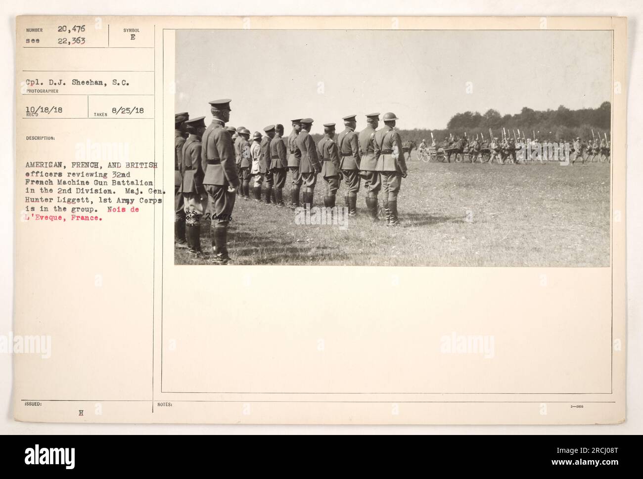 American, French, and British officers reviewing the 32nd French Machine Gun Battalion in the 2nd Division at Nois de L'Eveque, France. Major General Hunter Liggett, 1st Army Corps, is seen in the group. Photograph taken on August 25, 1918. Stock Photo