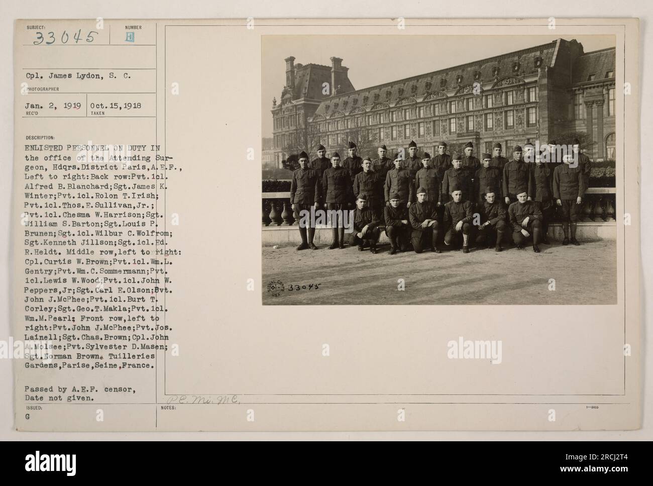 Enlisted personnel on duty in the office of the Attending Surgeon, Hdqrs. District Paris, A.E.F. Pictured are soldiers from various ranks, including Pvt. 101. Alfred B. Blanchard, Sgt. James K. Winter, Pvt. 1cl. Rolon T.Irish, and others. The photo was taken in the Tuilleries Gardens, Paris, France during World War One. Caption contains factual information. Stock Photo