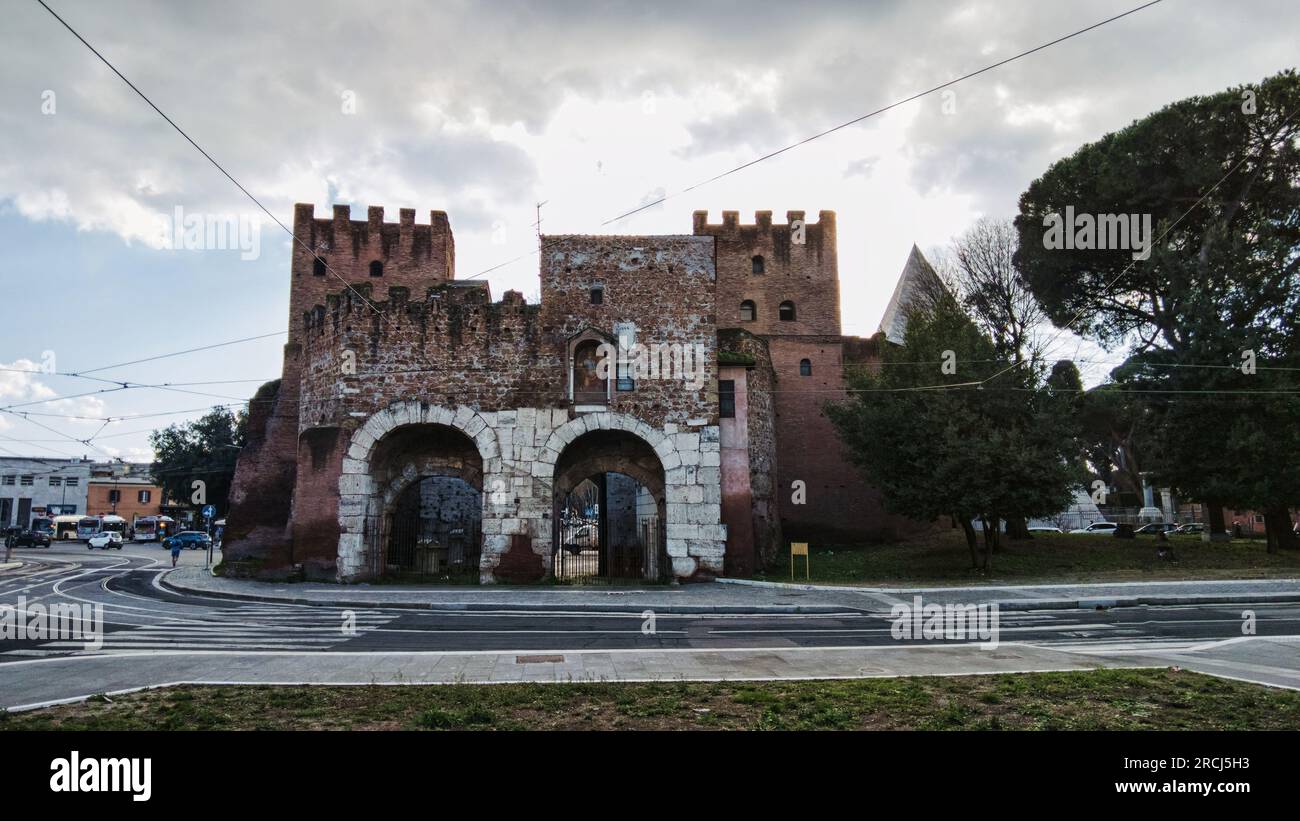 Ancient Rome landmark with majestic well preserved Porta San Paolo gate one of the southern gates of the Aurelian Walls that protected Rome located at Stock Photo