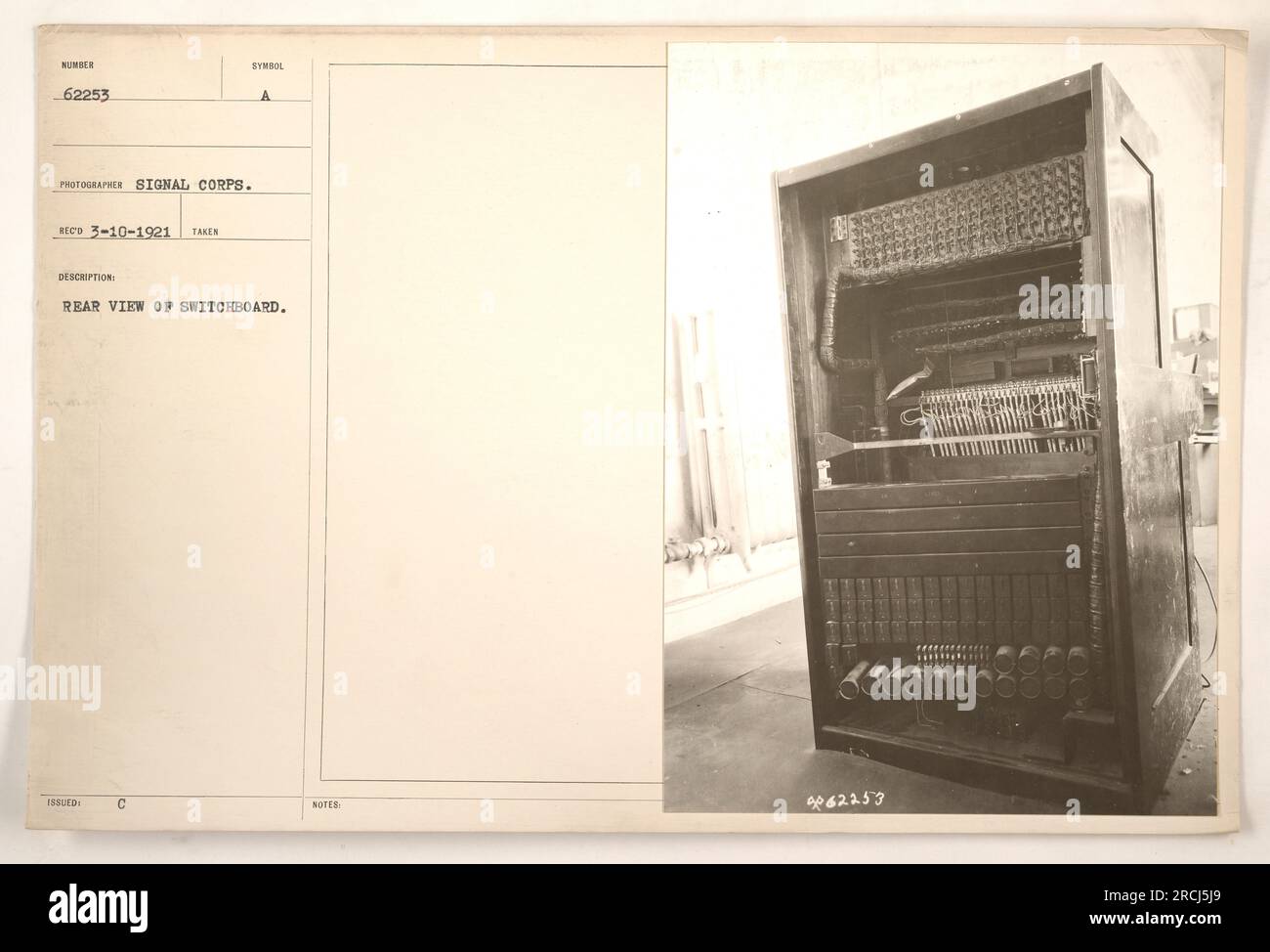 Rear view of switchboard NUMBER 62253. This photograph was taken by the Signal Corps on March 10, 1921. It shows the symbol issued for a rear view of a switchboard. The accompanying notes mention the switchboard ID as 4062253. Stock Photo