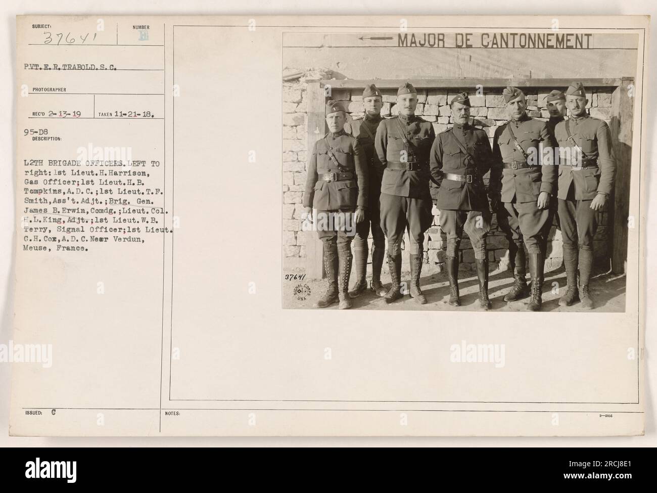 'Officers of the 12th Brigade, left to right: 1st Lieut. H. Harrison, Gas Officer; 1st Lieut. H. B. Tompkins, A. D. C.; 1st Lieut. T. F. Smith, Ass't. Adjt.; Brig. Gen. James B. Erwin, Comdg.; Lieut. Col. H.L.King, Adjt.; 1st Lieut. W. B. Terry, Signal officer; 1st Lieut. C.H. Cox, A. D. C. Neer Verdun, Meuse, France. Taken on November 21, 1918, by P.Vt.E. R.Trabold, official photographer for the U.S. Signal Corps during World War I.' Stock Photo