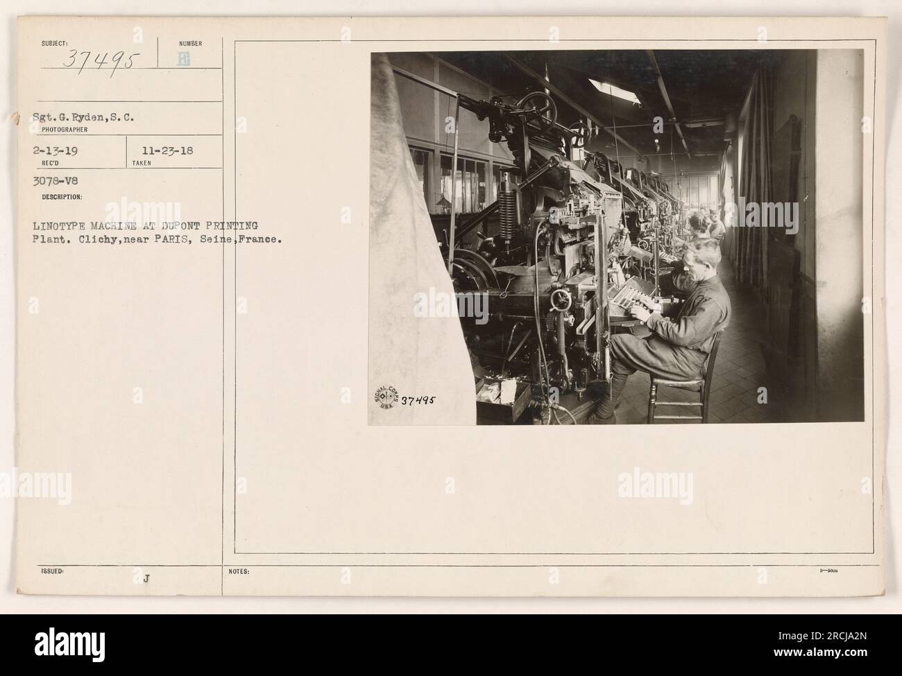 Sgt. G. Ryden photographed a Linotype machine at the DuPont Printing Plant in Clichy, near Paris, France. The photo was issued on November 23, 1918, and received on February 13, 1919. Notes state the photo's ID as 37495. Stock Photo