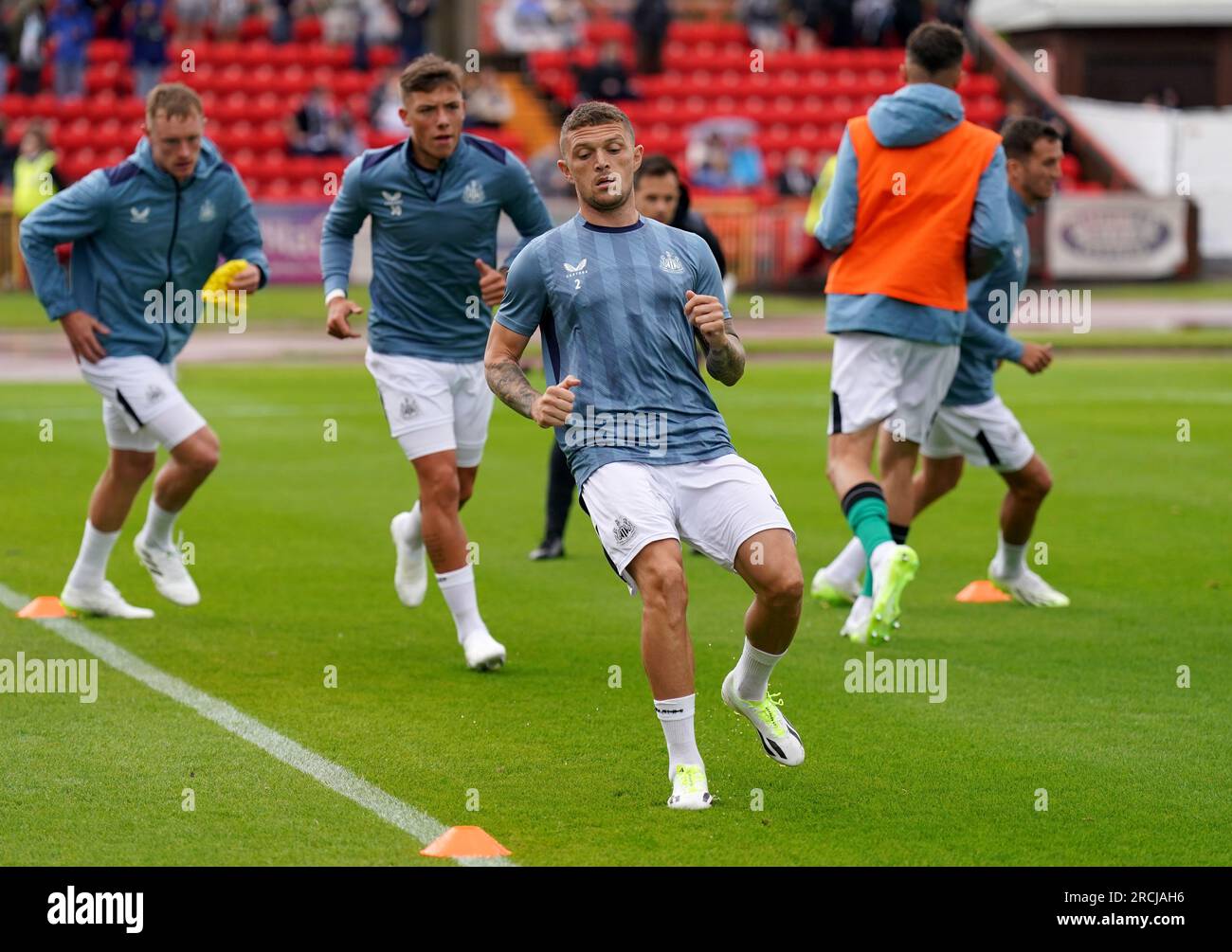 Newcastle United's Kieran Trippier (centre) during the warm up before the pre-season friendly match at the Gateshead International Stadium, Gateshead. Picture date: Saturday July 15, 2023. Stock Photo