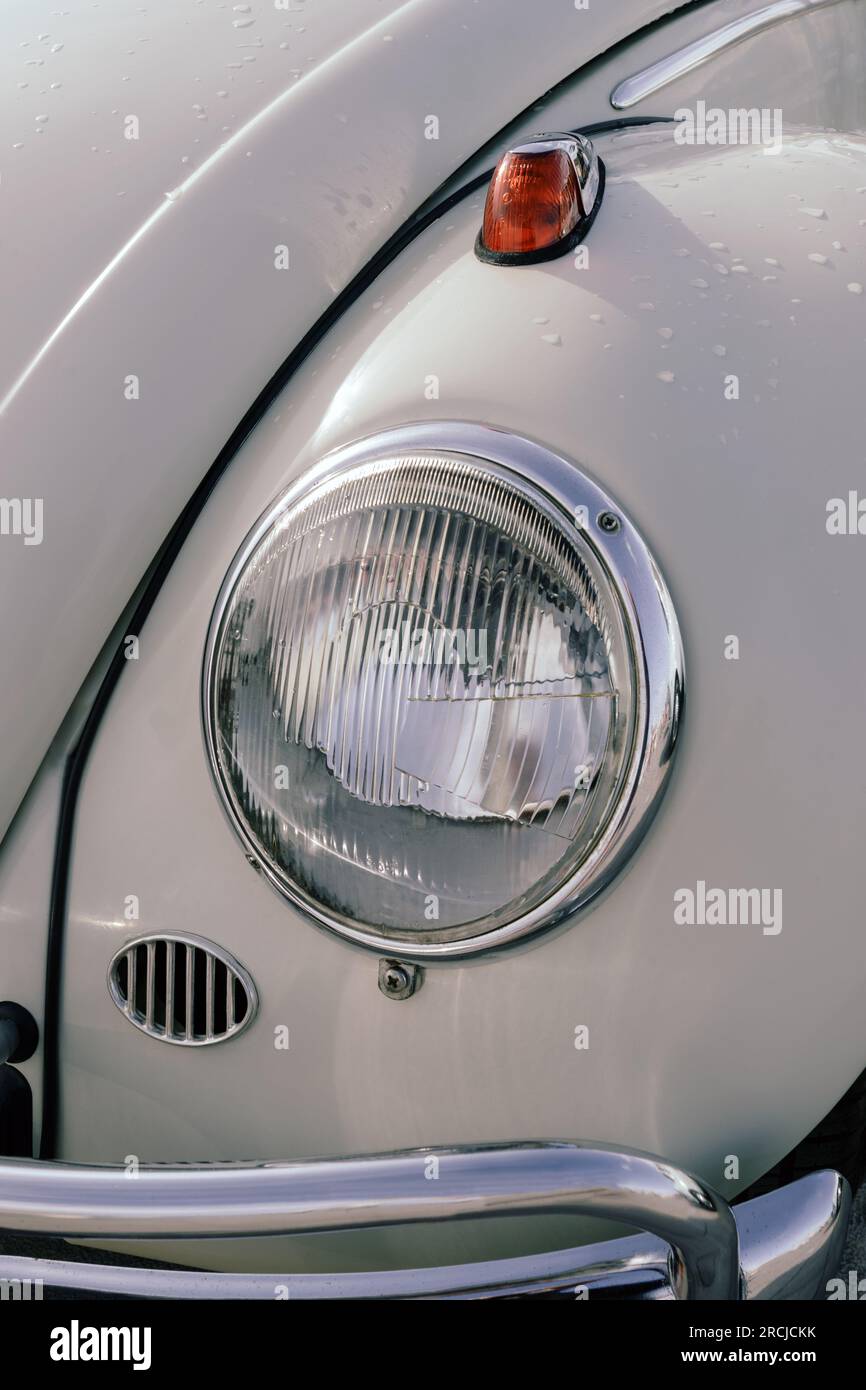 Close up detail of Volkswagen Beetle classic car parked in a street during raid of vintage cars Stock Photo