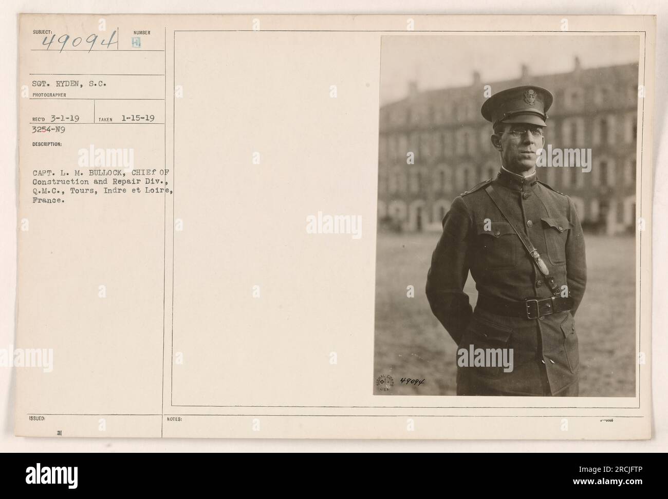 Captain L.M. Bullock, Chief of Construction and Repair Division, Q.M.C., Tours, Indre et Loire, France. Sergeant Ryden, S.C. photographer, captured this image on January 15, 1919. The photograph has a reference number of 3254-N9. Captain Bullock is seen wearing his issued uniform in the picture. Stock Photo