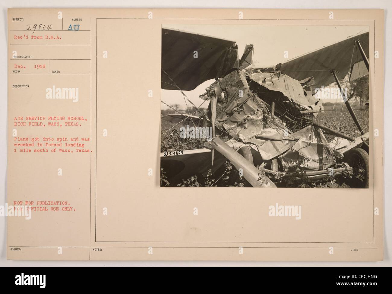 Image of a wrecked airplane at Rich Field, Waco, Texas, during World War One. The plane crashed after going into a spin during a forced landing, approximately one mile south of Waco. D.M.A. Photographer captured this image on December 1918. This photo is not meant for publication and is for official use only. Stock Photo