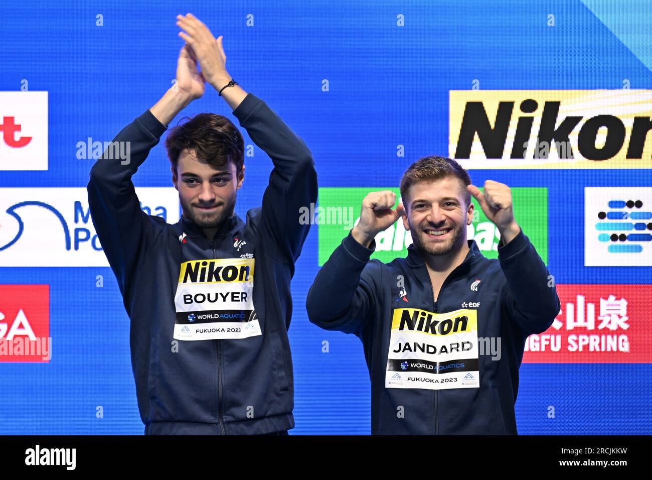 Fukuoka, Japan. 15th July, 2023. Jules Bouyer (L)/Alexis Jandard of France react during the medal ceremony after the men's synchronised 3m springboard final of World Aquatics Championships 2023 in Fukuoka, Japan, July 15, 2023. Credit: Zhang Xiaoyu/Xinhua/Alamy Live News Stock Photo