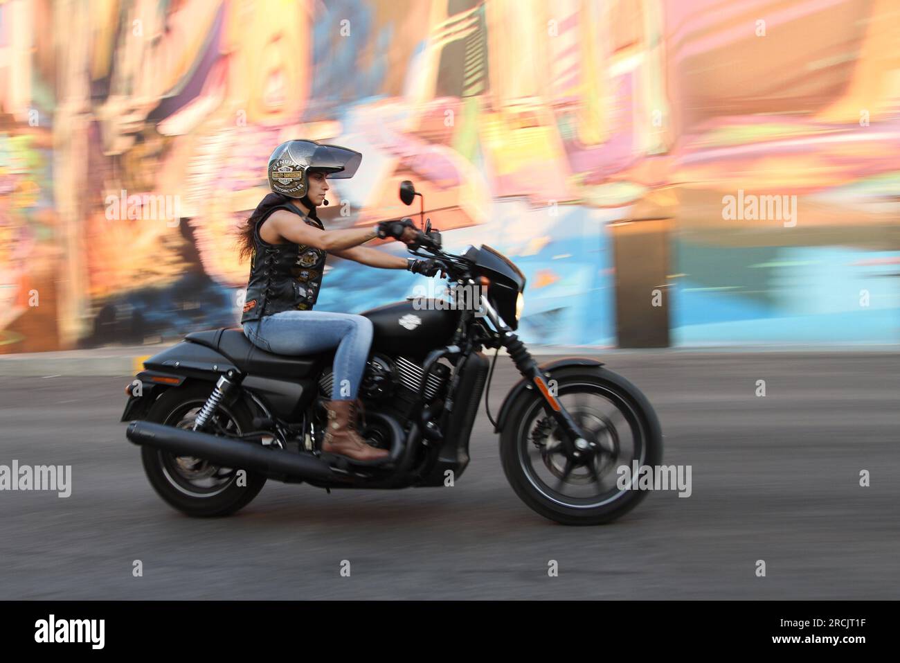 A woman driving the Harley Davidson which is rear in Lebanon. Stock Photo