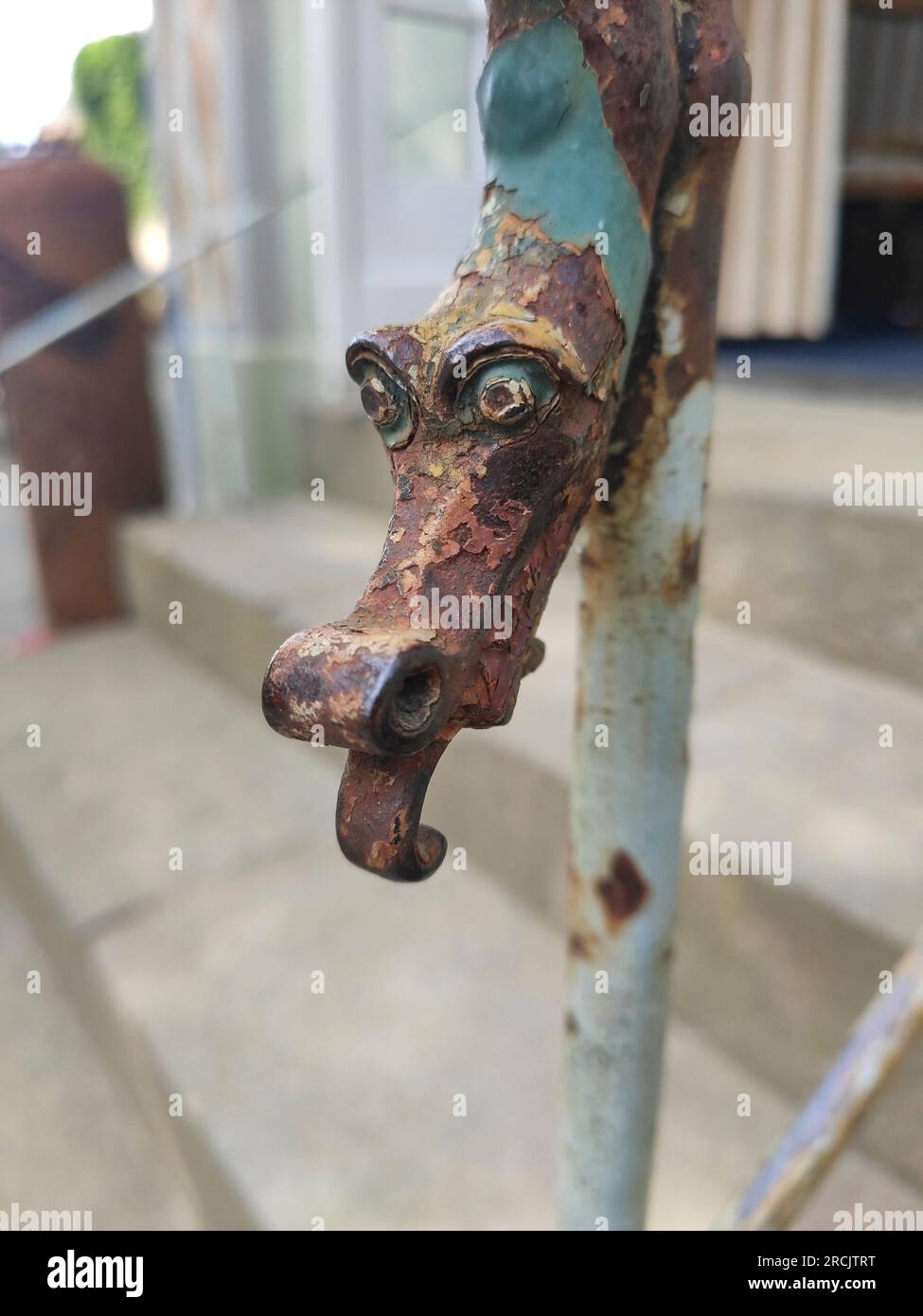 Dragon Hand Rails Dragon on a handrail at the Drachenhaus Cafe entrance Stock Photo - Alamy