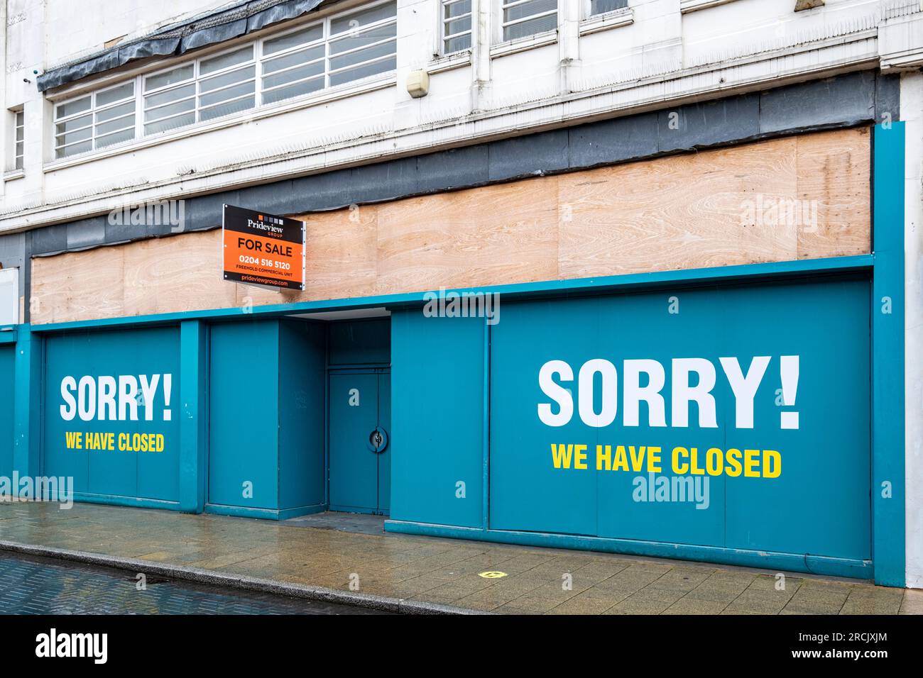 Closed down Poundland shop and building for sale in town centre of Crewe Cheshire UK Stock Photo