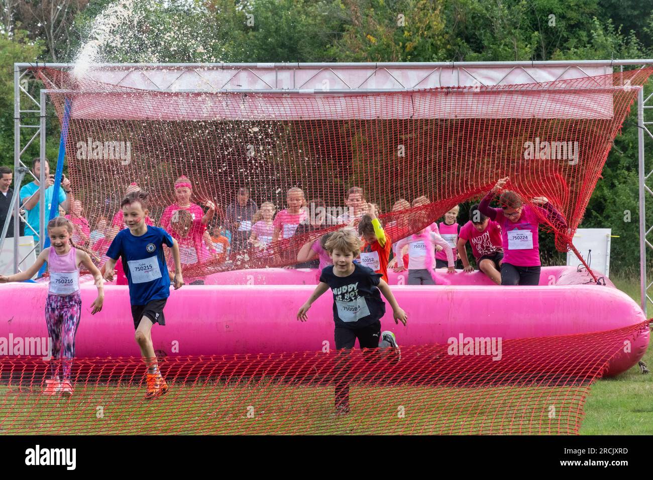 July 15th, 2023. The Reading Pretty Muddy Race for Life event took place in Prospect Park, Reading, Berkshire, England, over the weekend, with obstacle races for kids and adults. The charity event raises money for Cancer Research UK. Stock Photo