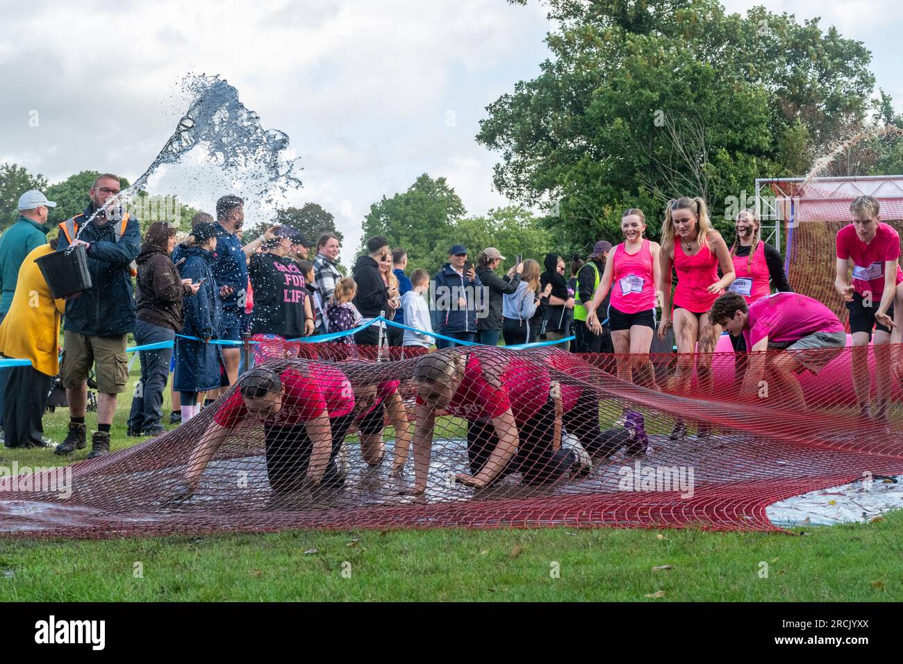 July 15th, 2023. The Reading Pretty Muddy Race for Life event took place in Prospect Park, Reading, Berkshire, England, over the weekend, with obstacle races for kids and adults. The charity event raises money for Cancer Research UK. Stock Photo