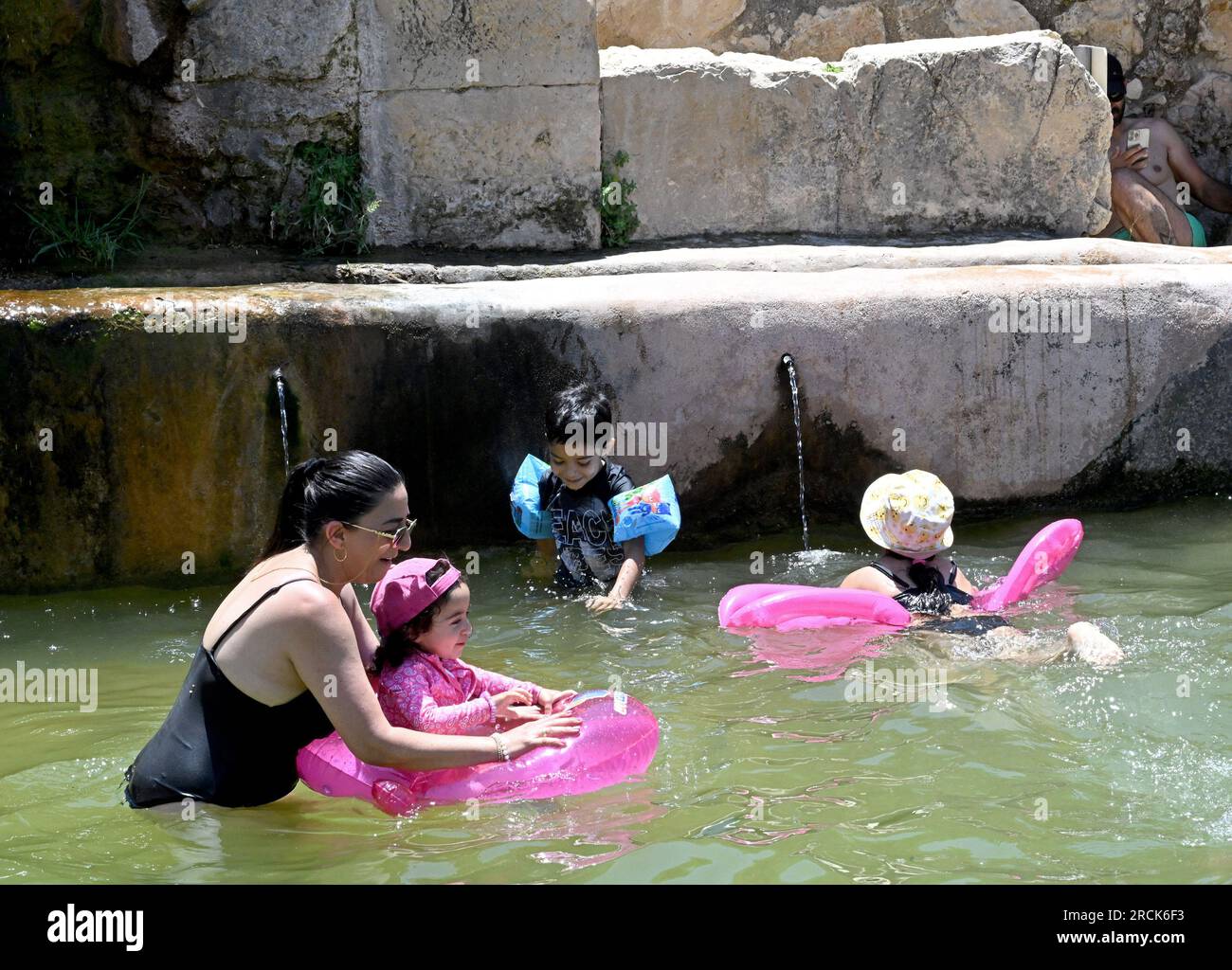 Haniya Spring, West Bank. 15th July, 2023. Israelis cool off in a pool ...
