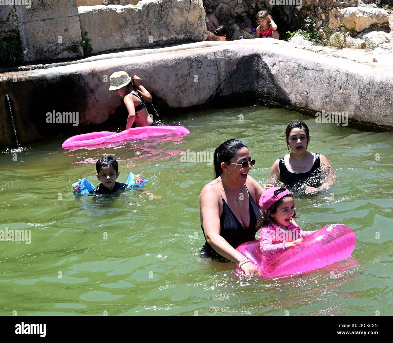 Haniya Spring, West Bank. 15th July, 2023. Israelis cool off in a pool ...