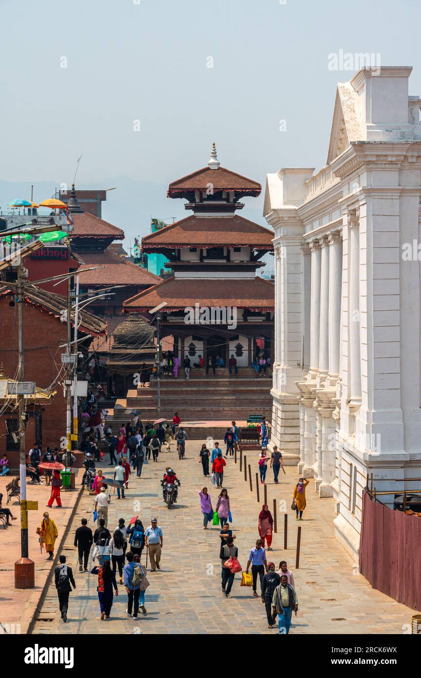 Kathmandu, Nepal - Apr 17, 2023: A landscape of a crowded local market near Kathmandu Durbar Square, The square is a historically UNESCO World Heritag Stock Photo