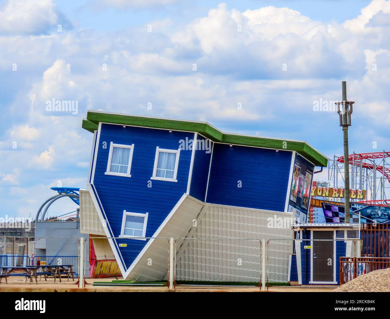 upside down house funfair attraction Southsea England Stock Photo - Alamy