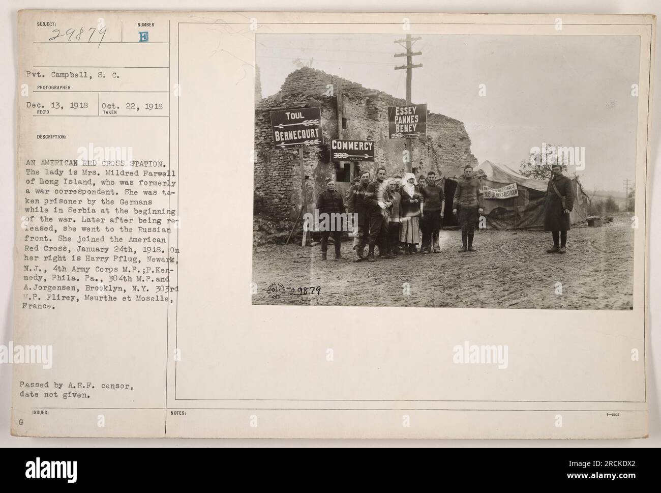 American Red Cross station in Flirey, France during World War One. The lady in the photograph is Mrs. Mildred Farwell, a former war correspondent who was taken prisoner by Germans in Serbia. She later joined the American Red Cross. Also pictured are Harry Pflug, 4th Army Corps M.P.; F.Kennedy, 304th M.P.; and A. Jorgensen, 303rd M.P. Stock Photo