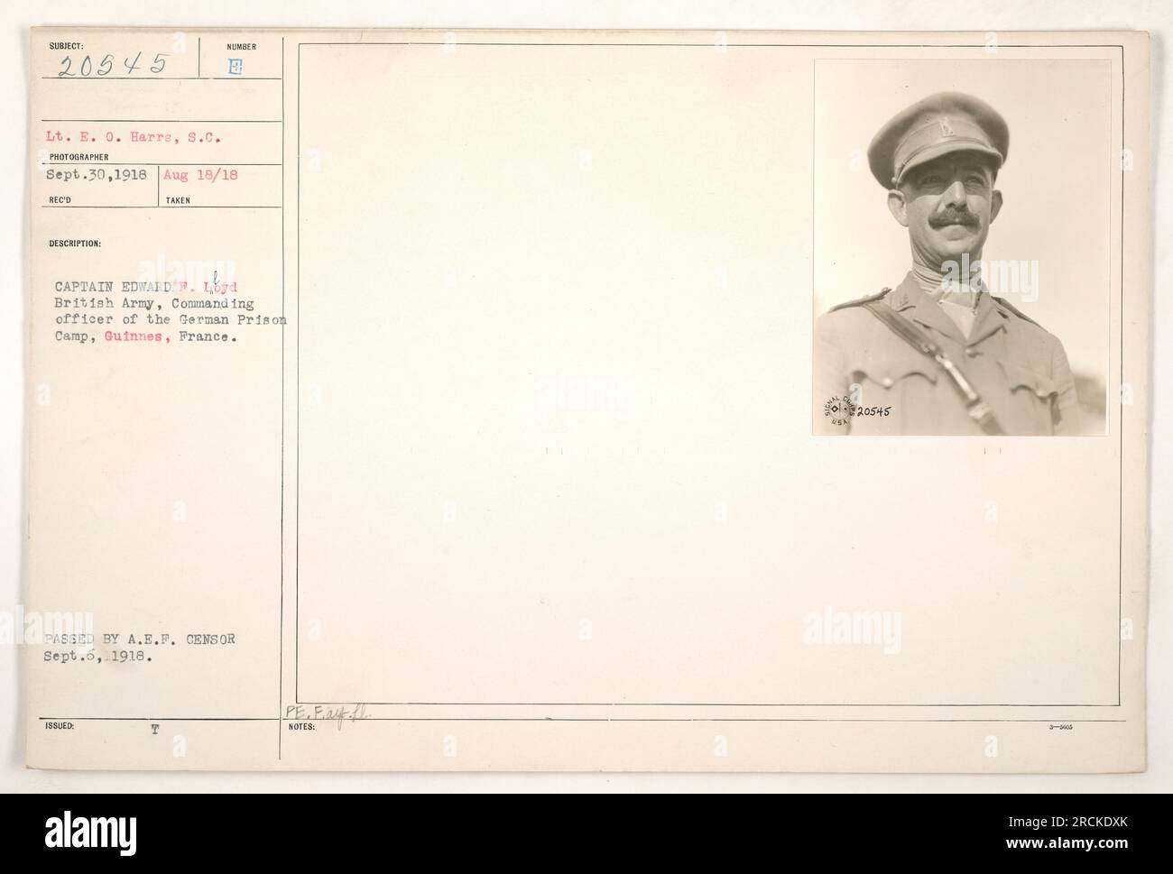 This image, captured by Lt. E. O. Harrs on September 30, 1918, depicts Captain Edward P. Loyd of the British Army. He is seen in his role as the commanding officer of the German Prison Camp located in Guinnes, France. The photograph was approved by the A.E.P. censor on September 6, 1918. Stock Photo