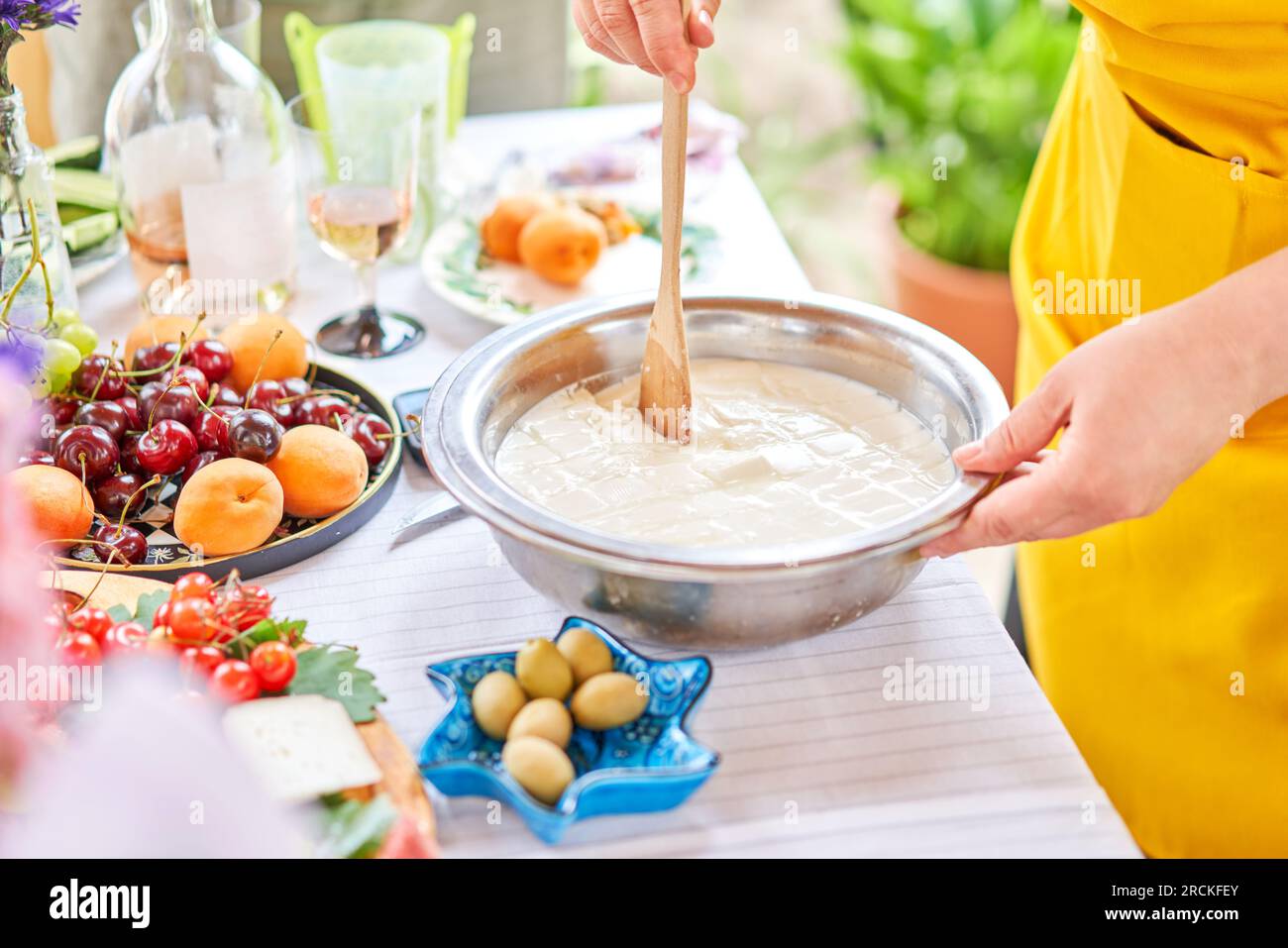 Master class and cheese tasting. Women make cheese. The enzyme and