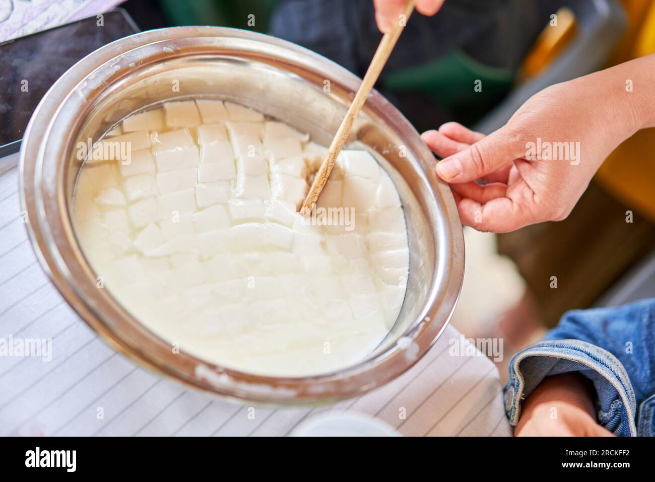 Master class and cheese tasting. Women make cheese. The enzyme and