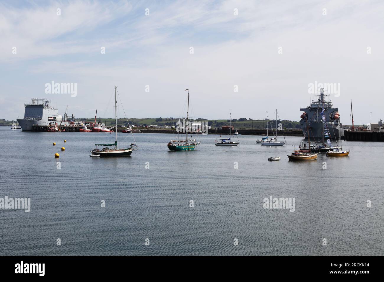Royal Navy ships in Falmouth, the ship to the left is in for a major refit and has been in port some time. Stock Photo